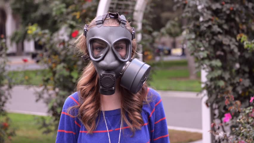 girl in gas mask around the rose