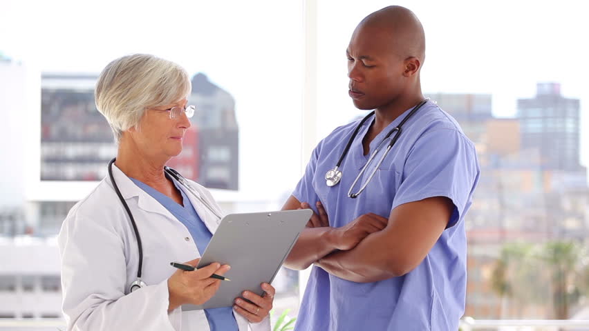 Doctor Talking With Her Patient Stock Footage Video 942961 Shutterstock