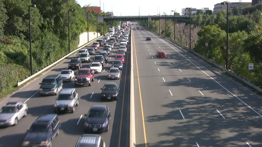 Highway Timelapse. Heavy vs. light traffic. Good audio as cars in empty lane whoosh by.
