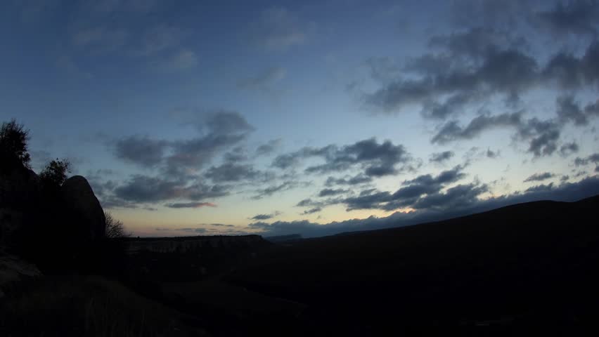 Timelapse sunrise in the mountains. Cave city Eski-Kermen, Crimea, Ukraine 