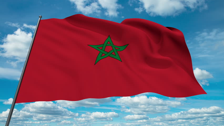 Marocco flag waving against time-lapse clouds background