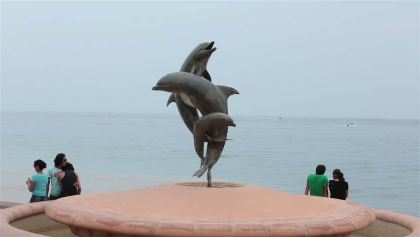 PUERTO VALLARTA, MEXICO - CIRCA NOV 2012: Malecon Friendship Fountain dolphin circa November 2012 in Puerto Vallarta, Mexico.
