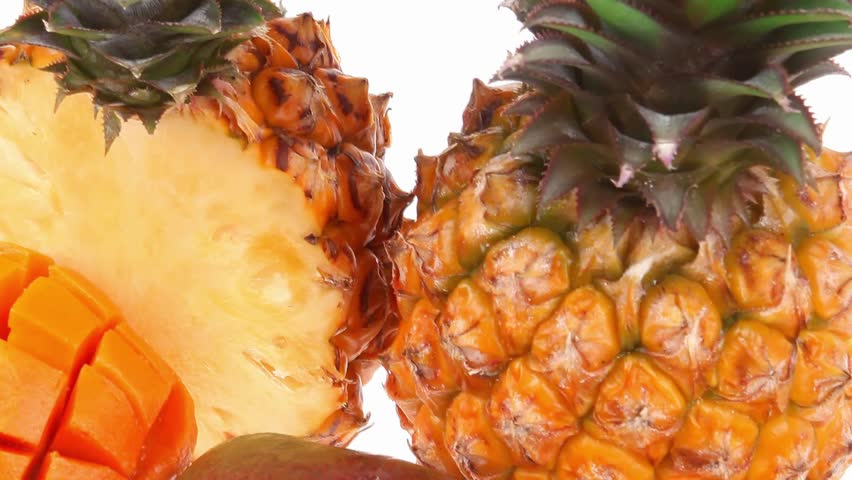 exotic diet food - set of lot of tropical fruits include pineapple and mango isolated over white background