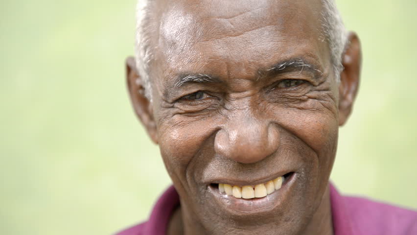 Portrait of old black people, happy senior african american man with white hair looking at camera and smiling. Sequence
