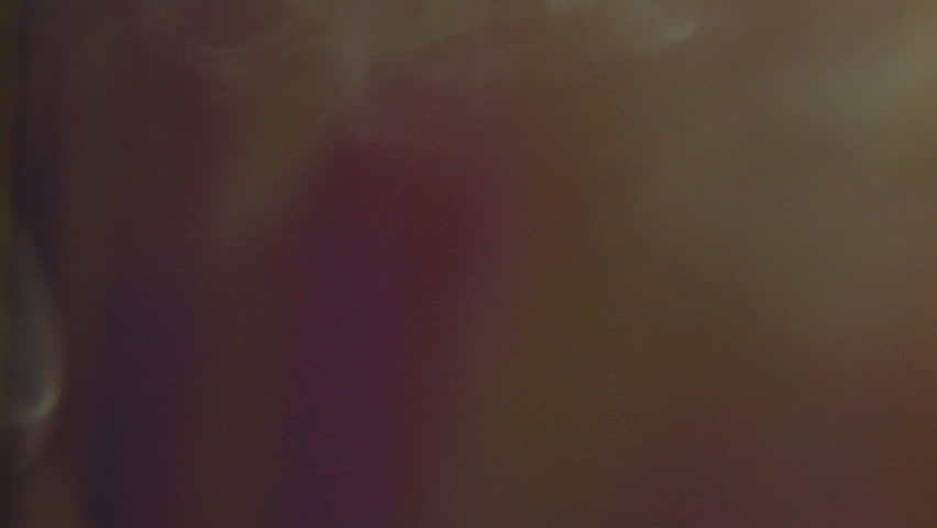 Velvety multi-hued background with smoke tendrils