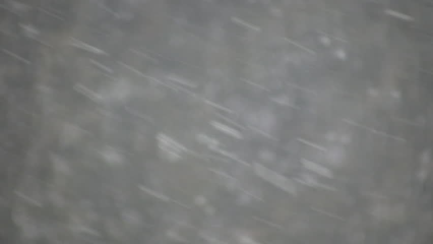 Snowflakes shoot across the screen in this blizzard scenic (High Definition)