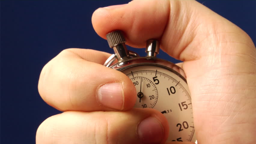 stop-watch in hand