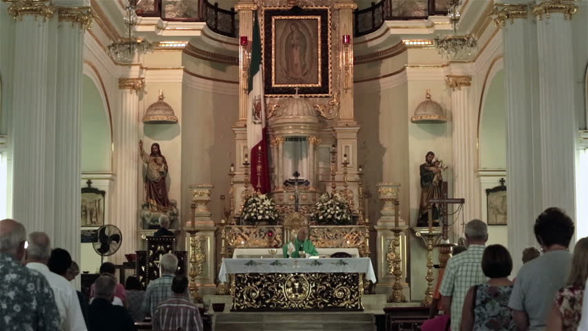 PUERTO VALLARTA MEXICO NOV 2012: In difficult economic times Mexican citizens continue to go to church for guidance and strength. Puerto Vallarta Our Lady of Guadalupe church sacrament. 