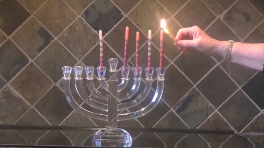 Lighting Hanukkah Candles 5th Night