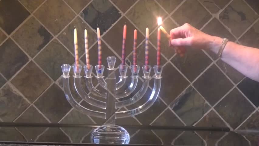 Lighting Hanukkah Candles 7th Night