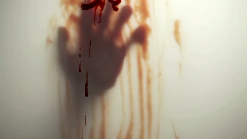 Blood-smeared hand - probably of a crime victim - behind frosted glass
