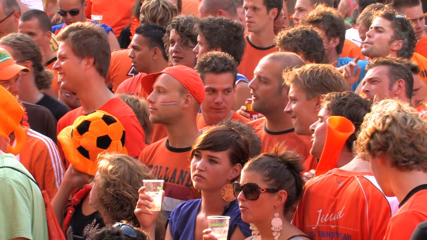 GRONINGEN, HOLLAND - JULY 11: Dutch soccer fans supporting their team during the final of the FIFA World Cup 2010 Netherlands vs. Spain - July 11, 2010 in Groningen, the Netherlands.