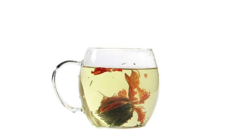 Cup with tea bud and boiling water
