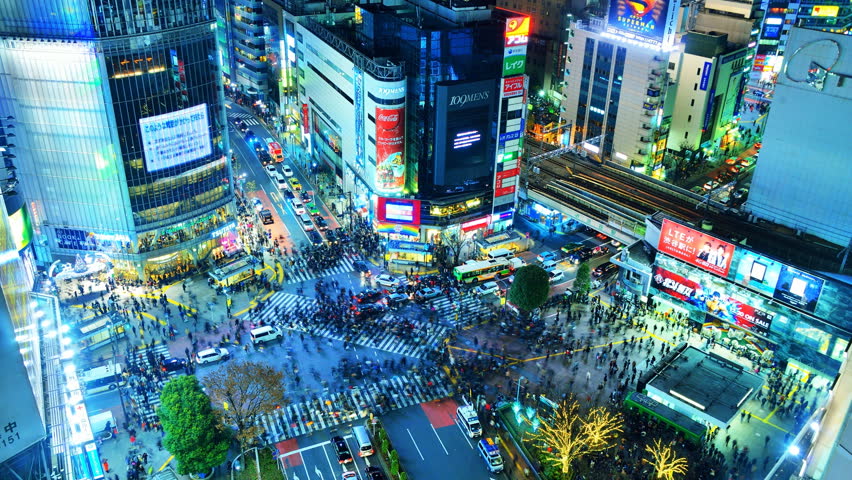 TOKYO - DECEMBER 23: Shibuya Crossing December 23, 2012 in Tokyo, JP. The crossing is one of the world's most famous examples of a Scramble Crosswalk.
