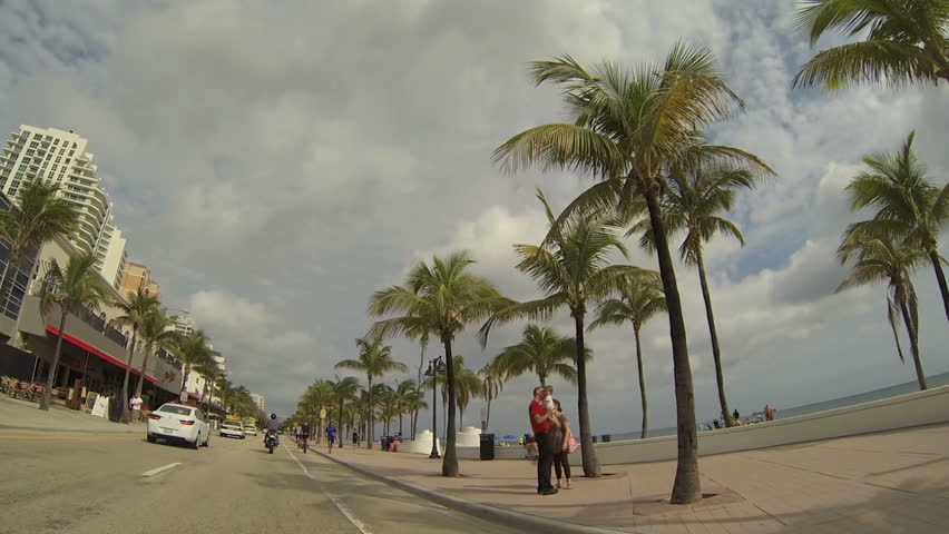 FORT LAUDERDALE - DEC 27: Driving on A1A in Fort Lauderdale Beach on December 27, 2012 in Fort Lauderdale, Florida, USA. A1A is the main road that runs by the beach and a popular tourist destination