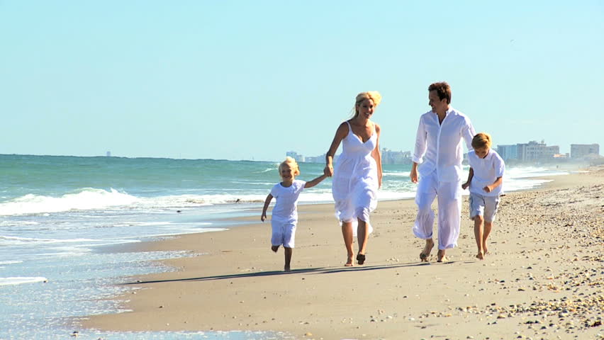 Summer Holiday Of Ethnic Happy Family Enjoying Together Beach Stock