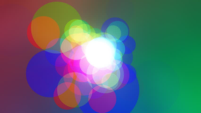 Colorcles - Colorful Circles Video Background Loop /// Colored circles refuse to be drawn to a mysterious gravity center. A nice one for musical events, for instance.