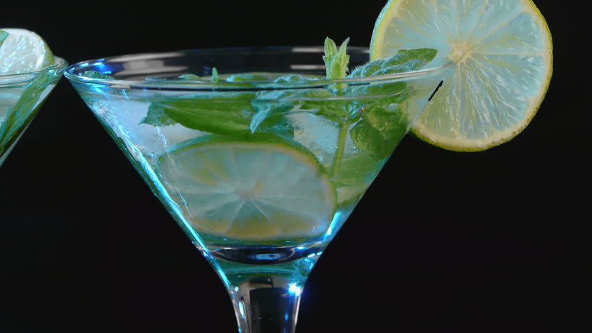 Martini cocktail with lime and mint closeup