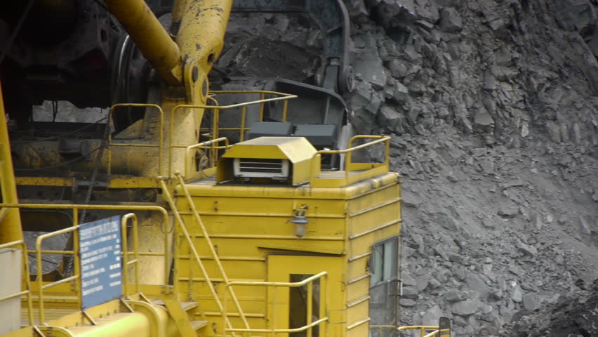 Mining dump trucks in the open pit mine, heavy truck in coal mine