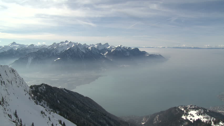 Amazing high altitude view over Lake Geneva in Switzerland shot from about 6,500ft. Includes inversion layer of haze trapped at lower altitude. Shot in full HD 1920x1080 30p on Sony EX1
