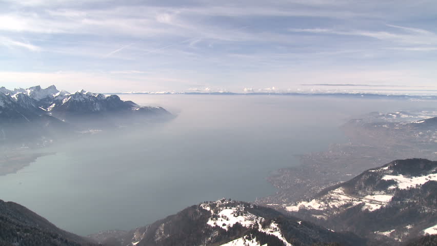 Amazing high altitude view over Lake Geneva in Switzerland shot from about 6,500ft. Includes inversion layer of haze trapped at lower altitude. Shot in full HD 1920x1080 30p on Sony EX1