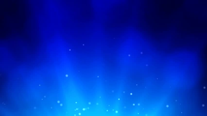 Rotating shinning light streaks up with light particles