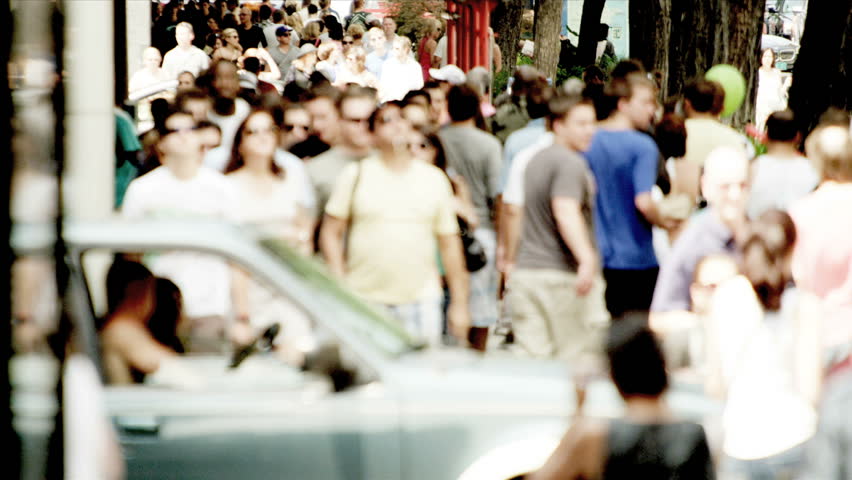 America - August 22, 2012: City population walking on busy sidewalks America, USA 