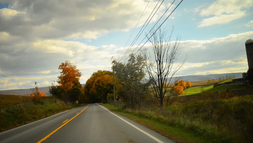 Time lapse of a drive through a hilly twisty road during glorious fall in rural Pennsylvania. 