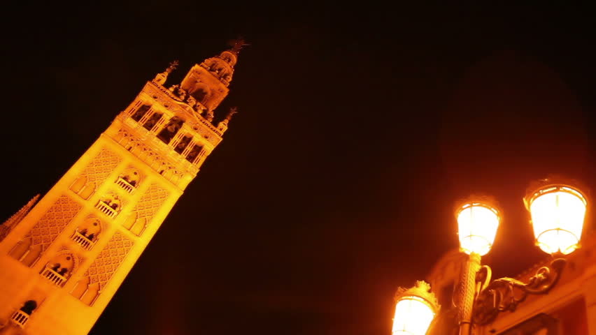 View of the famous Seville mos-che with its Giralda minaret in a typical day