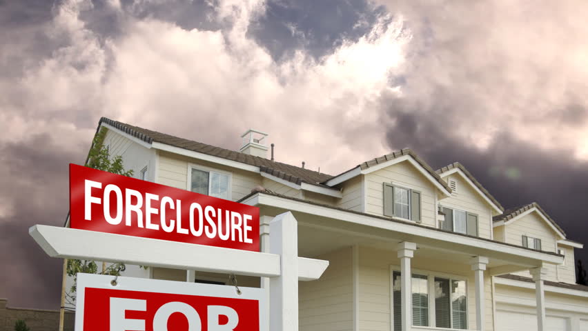 Foreclosure Home For Sale Sign, House and Time-lapse Clouds and rain.