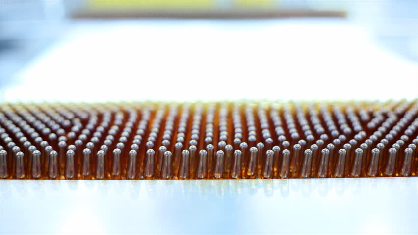 Optical inspection, inspects vials and ampoules for particulates in liquid and container defects. Soft focus and Shallow DOFF.