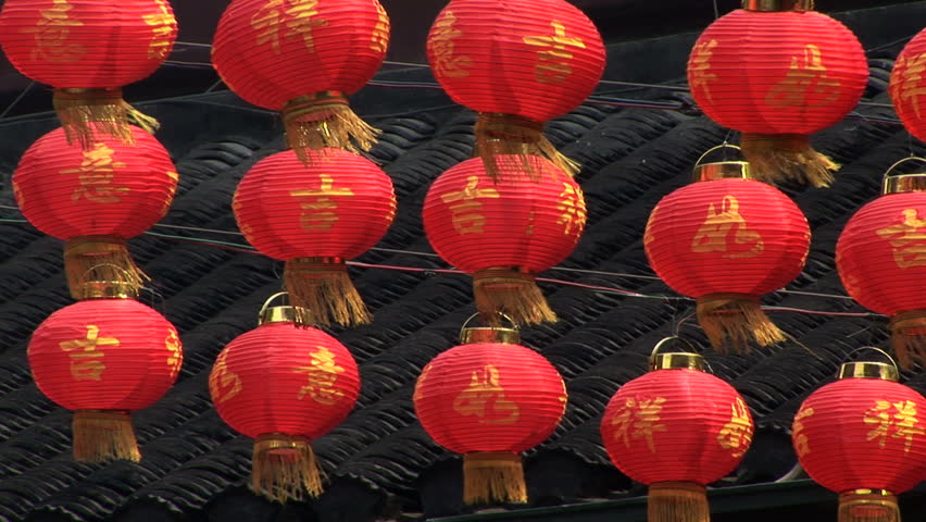 Chinese red paper lantern swaying in the wind