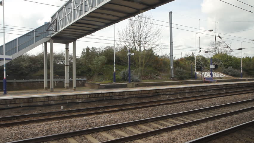 SANDY, ENGLAND - APRIL 3: Leaving Sandy station on April 3rd, 2012.  The station is 44 miles (71 km) north of London Kings Cross on the East Coast Main Line.