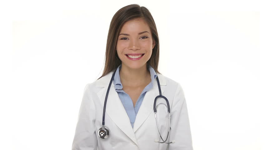Medical doctor shrugging in doubt thinking smiling happy. Young female woman medical professional wearing lab coat and stethoscope in decision making concept on white background. Multiracial woman.