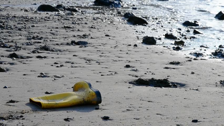 Lost boots at the beach