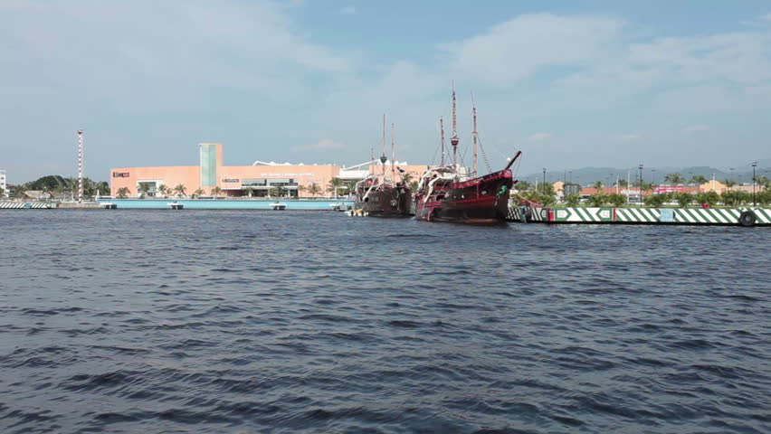 PUERTO VALLARTA, MEXICO NOV 2012: Mexican economy and tourism improves bringing increased income to business and resorts. Puerto Vallarta marina pirate ships shopping mall.
