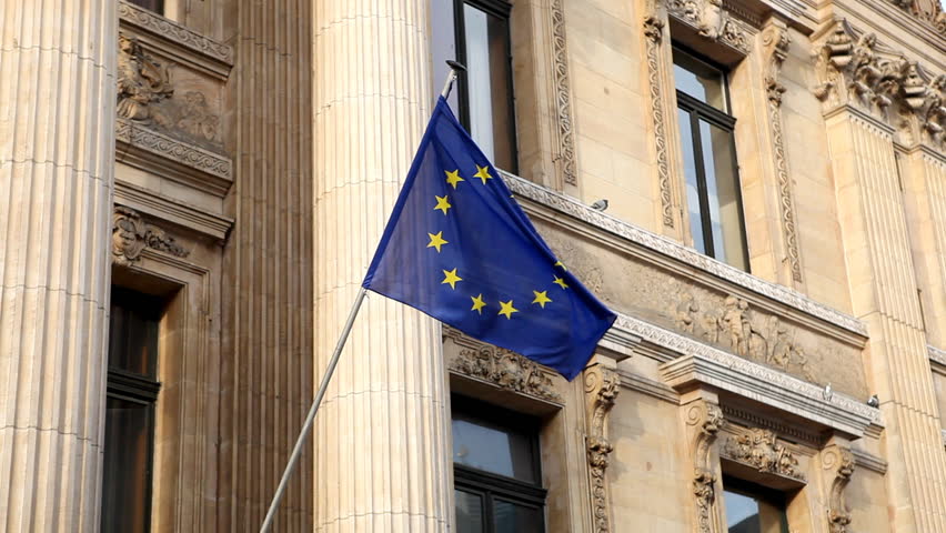 Stock Exchange Building (La Bourse de Bruxelles) in Brussels, European Flag, EURO