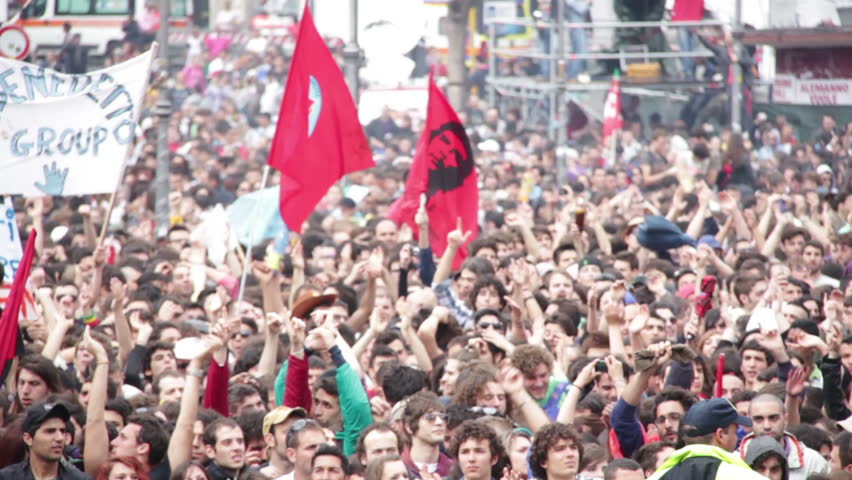 ROME, ITALY - MAY 1: People attend free "Concerto del Primo Maggio" ("Workers' Day Concert") in Piazza San Giovanni (San Giovanni Square) on Workers' Day, May 1, 2012 in Rome, Italy.