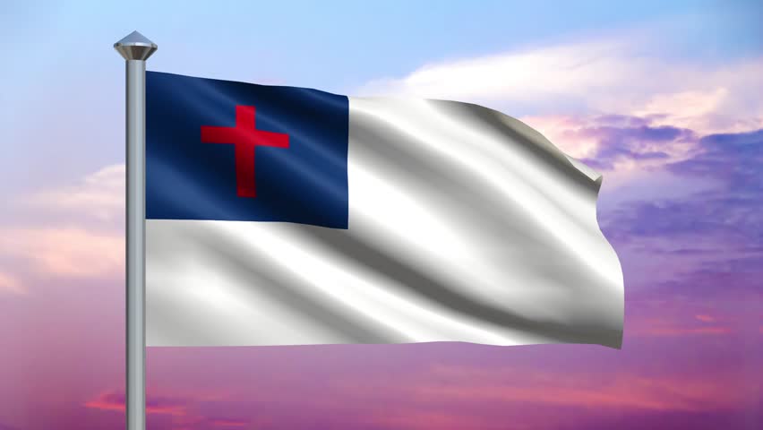 Perfectly seamless loop (no fade) features a Christian flag flying from a flag pole with a beautiful cloudy sunset sky behind.