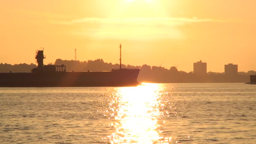Cargo ships in the sunset
