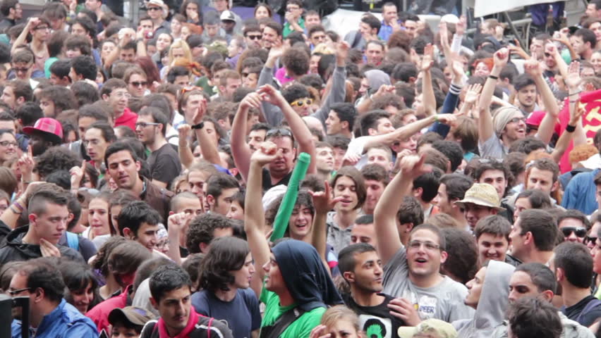 ROME, ITALY - MAY 1: People attend free "Concerto del Primo Maggio" ("Workers' Day Concert") in Piazza San Giovanni (San Giovanni Square) on Workers' Day, May 1, 2012 in Rome, Italy.