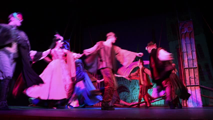 MOSCOW - FEB 3: Many actors dance on stage in medieval costumes and masquerade masks during musical - Francois Villon. Three days in Paris, at Palace on Yauza on February 3, 2012 in Moscow, Russia.
