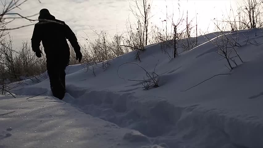 Walking in the Snow During Sunset / Sunrise