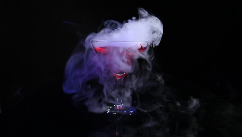 drink in glass with the effect of dry ice