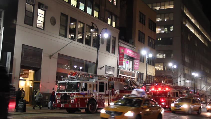 New York, NY - Circa 2011: Fire Truck in Front of Madison Avenue Building at night