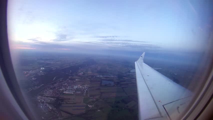 airplane flight over Munich, where the prospect can see the city in the distance stadium Allianz Arena, Bayern Munich