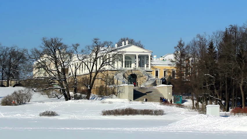 Panorama of Cameron Gallery and Grotto Pavilion , and group of tourists in winter in Pushkin (Tsarskoye selo), the environ of St. Petersburg, Russia
