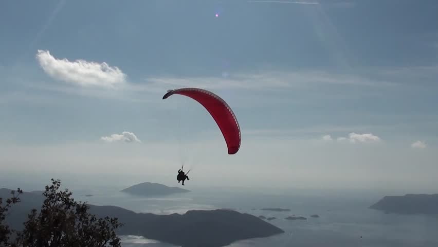 Parachute with two people sliding