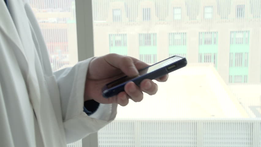 Doctor on his smart phone
