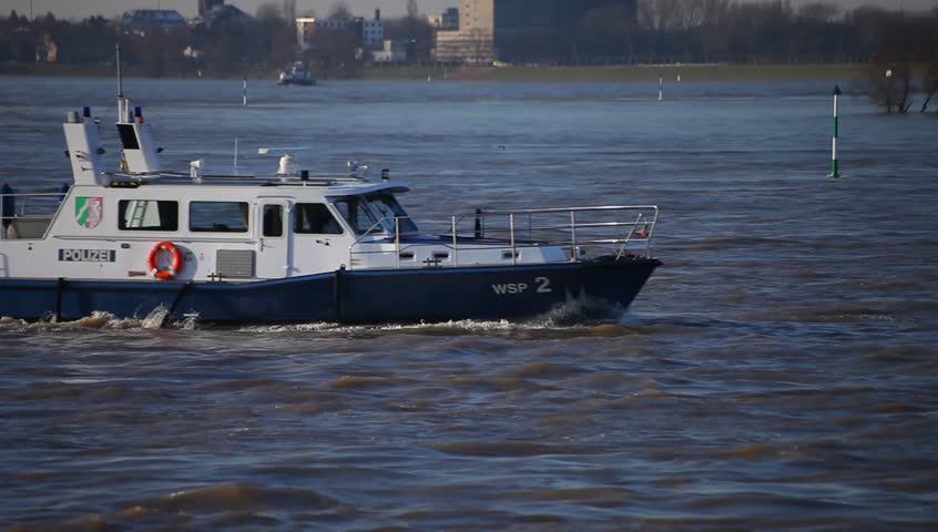 DUSSELDORF, GERMANY â FEBRUARY 6: German police watercraft patrols on the Rhine river. February 6, 2013,  DÃ¼sseldorf, Germany
